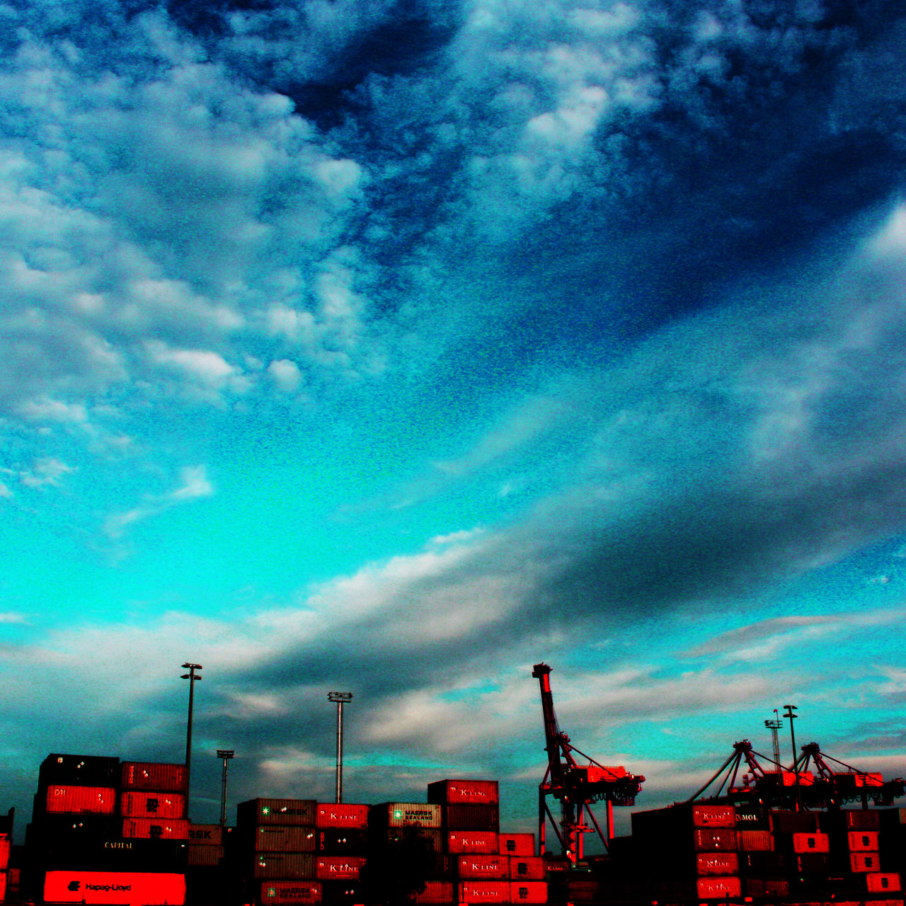 Big Sky, Red Cranes and Containers